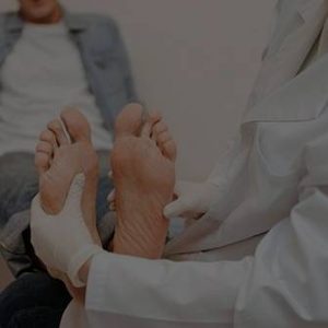doctor examining a patient's feet