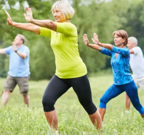 a group of people doing a tai-chi Balance Exercises 