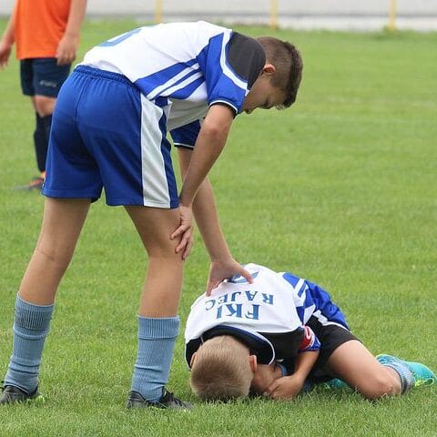 Young athlete suffering from sport injury 