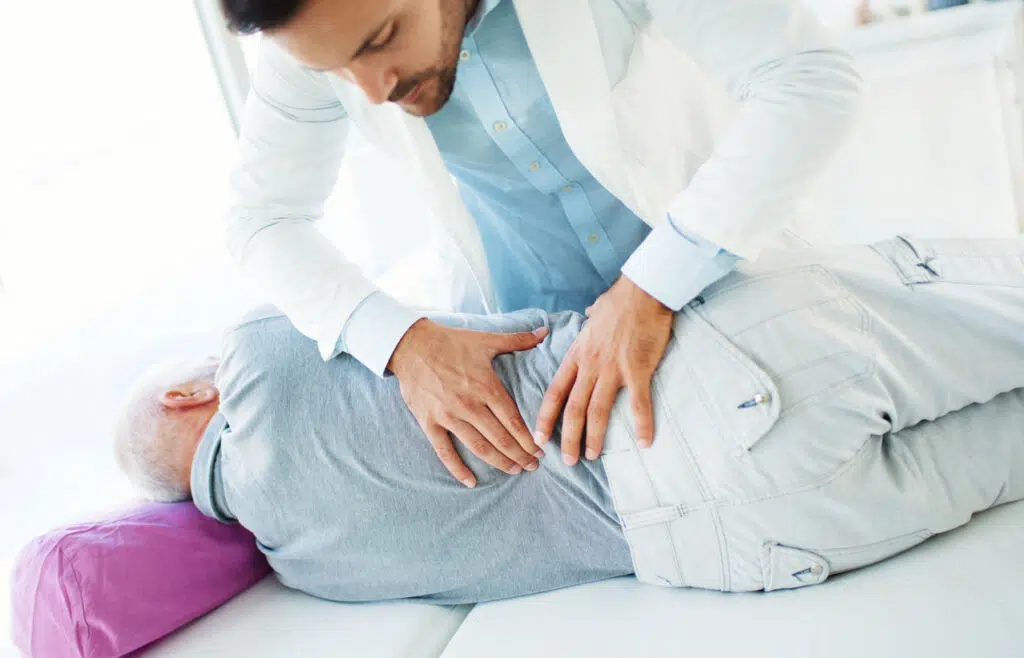 Senior patient having a chiropractic adjustment