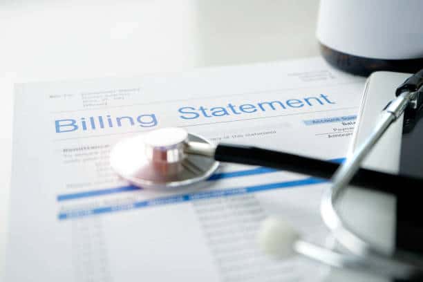 Health care billing statement with stethoscope,