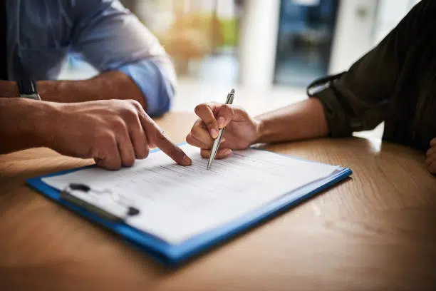 Patient filling out a medical insurance form