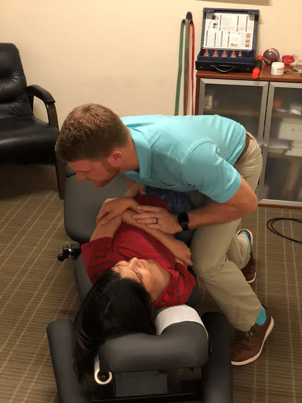 Chiropractor adjustment conducted at Hogan Spine and Rehab