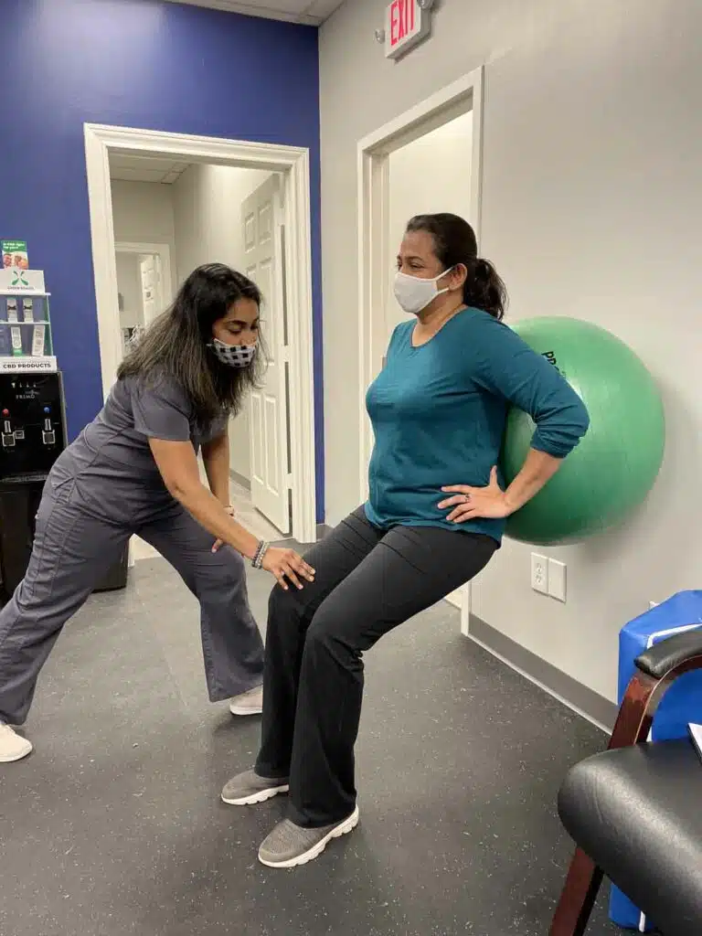 Patients having a physical therapy treatment at Hogan Chiropractic Center.