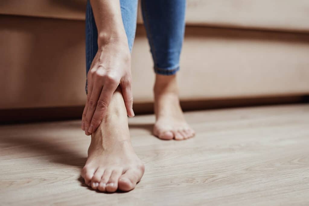 Woman suffers from Plantar fasciitis 