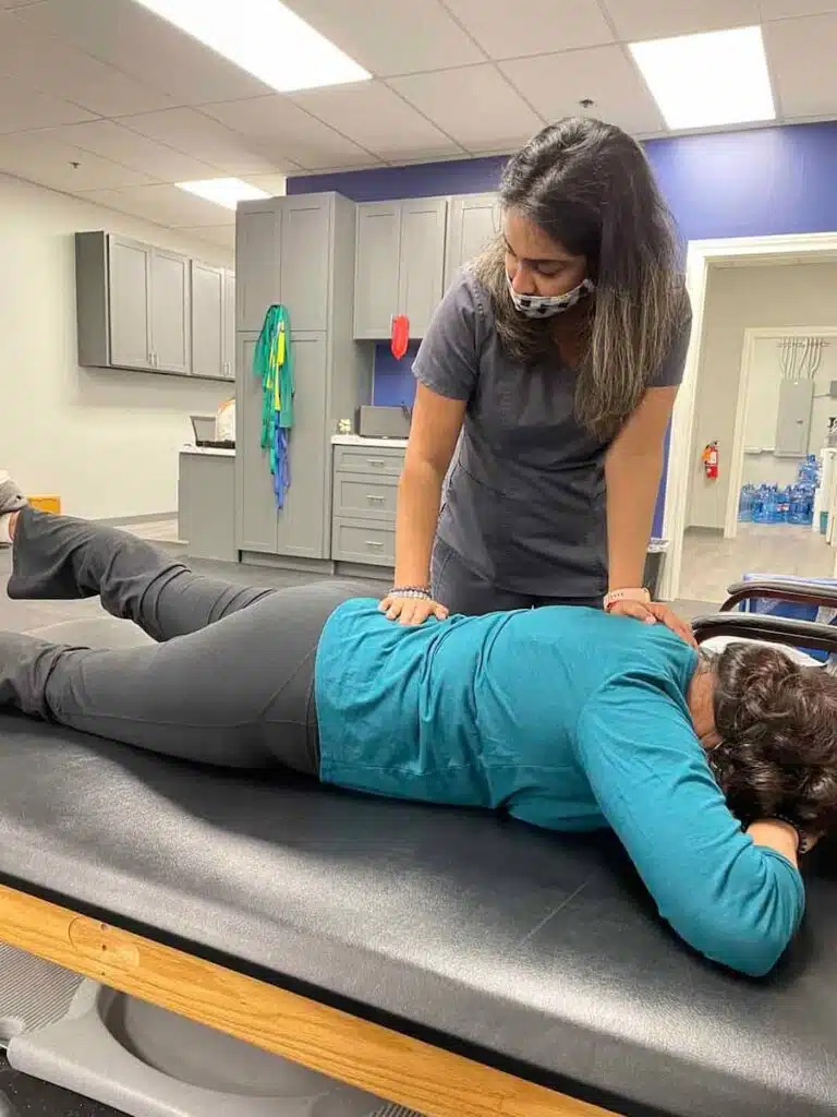 Chiropractic patient getting treatment at Hogan Chiropractic Center.