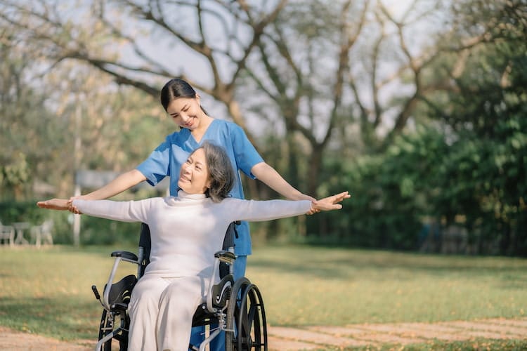 physical therapist having a walk with her patient